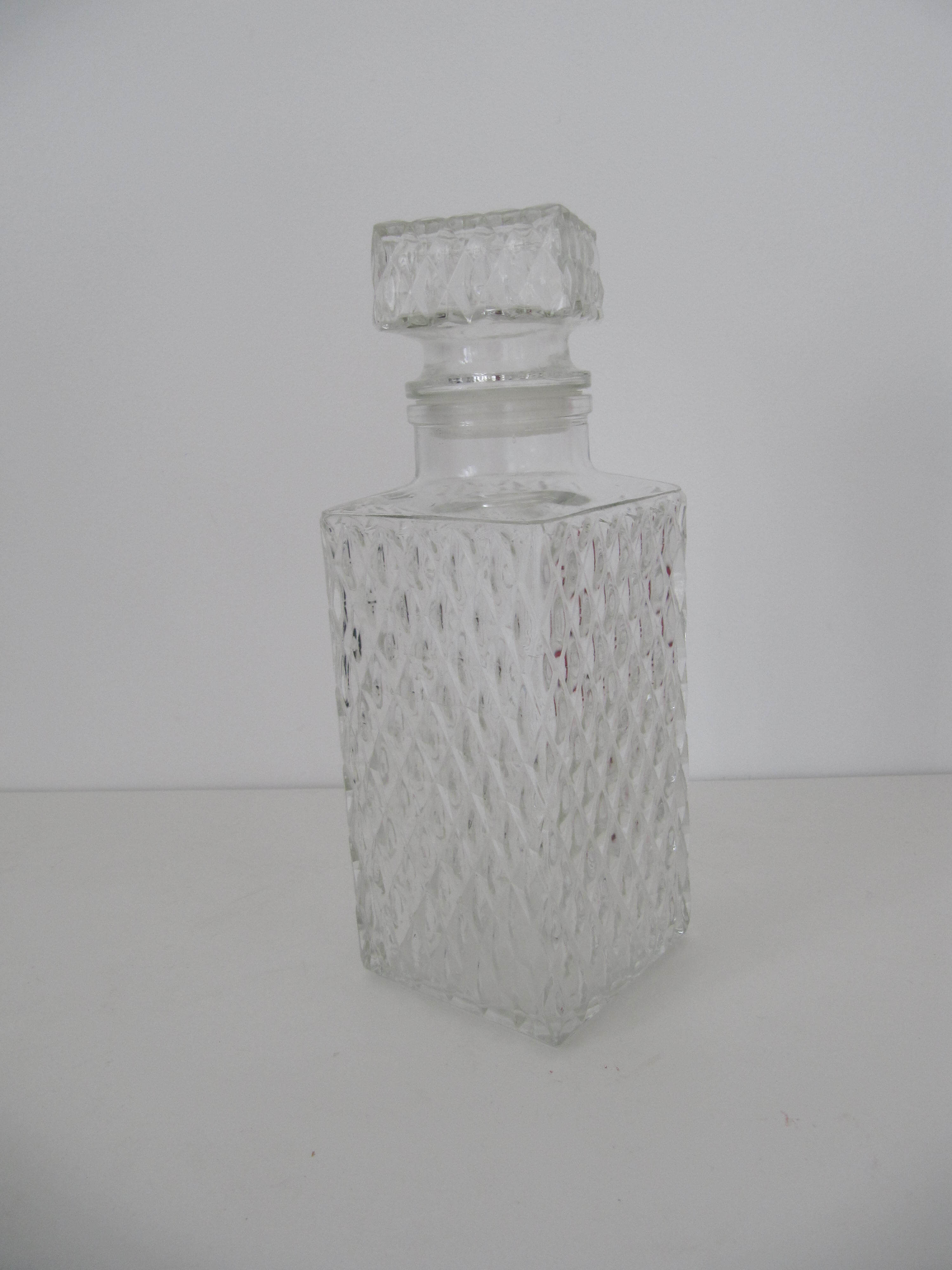 White glass vintage whiskey decanter