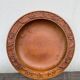 Carved wooden pocket emptier