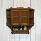 Early 20th-century English wall shelf in walnut.