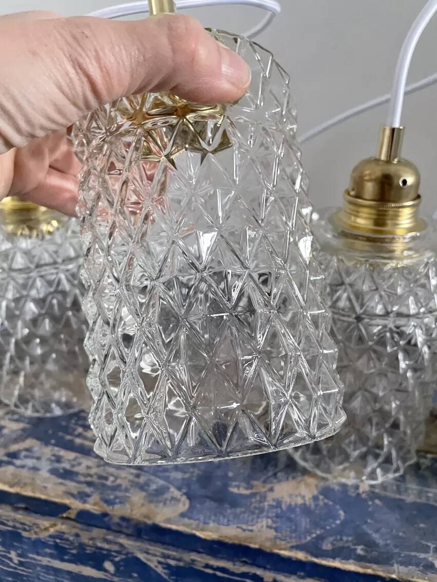 Set of three chiseled glass pendant lights of Scandinavian origin