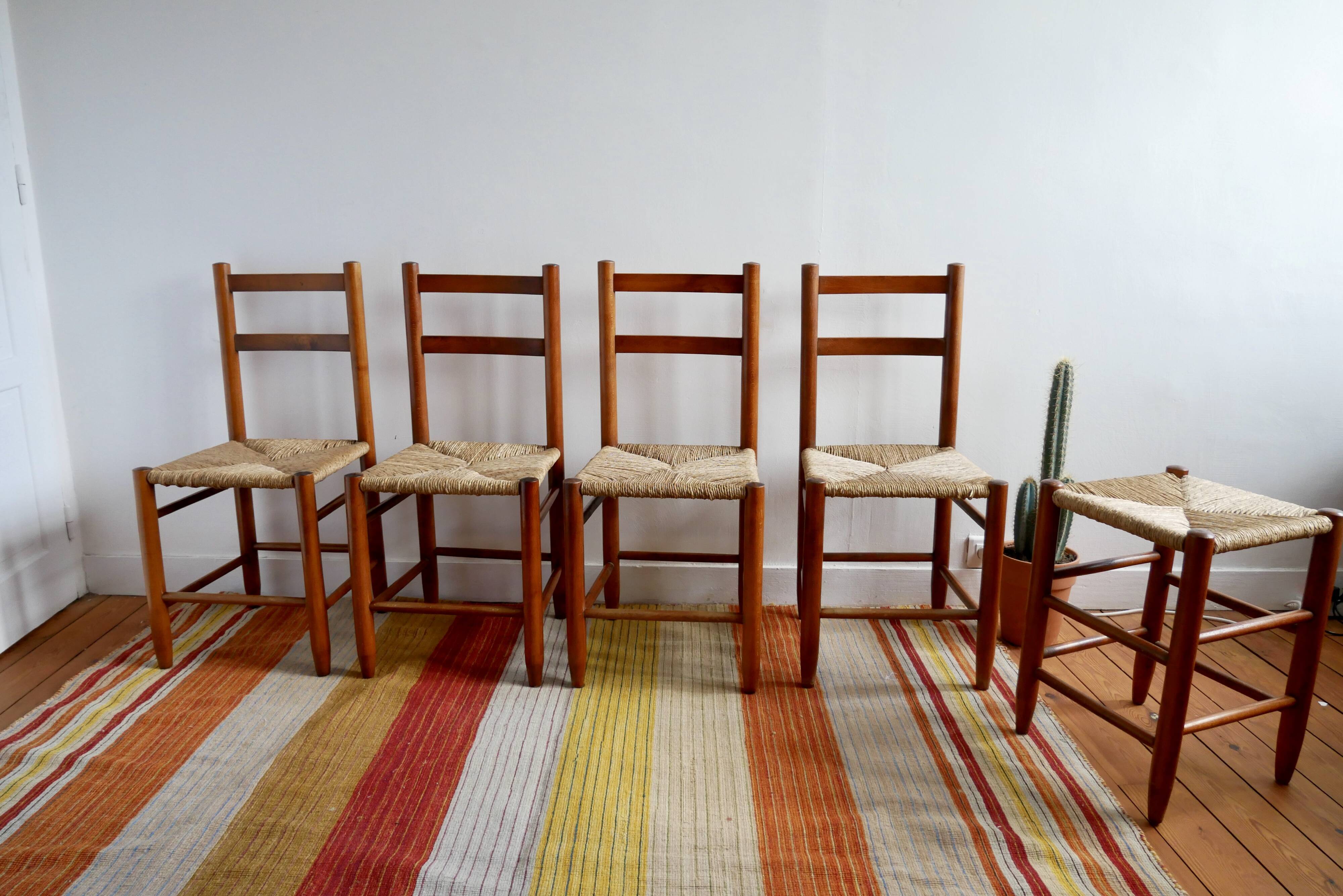 Set of 4 straw chairs and a stool