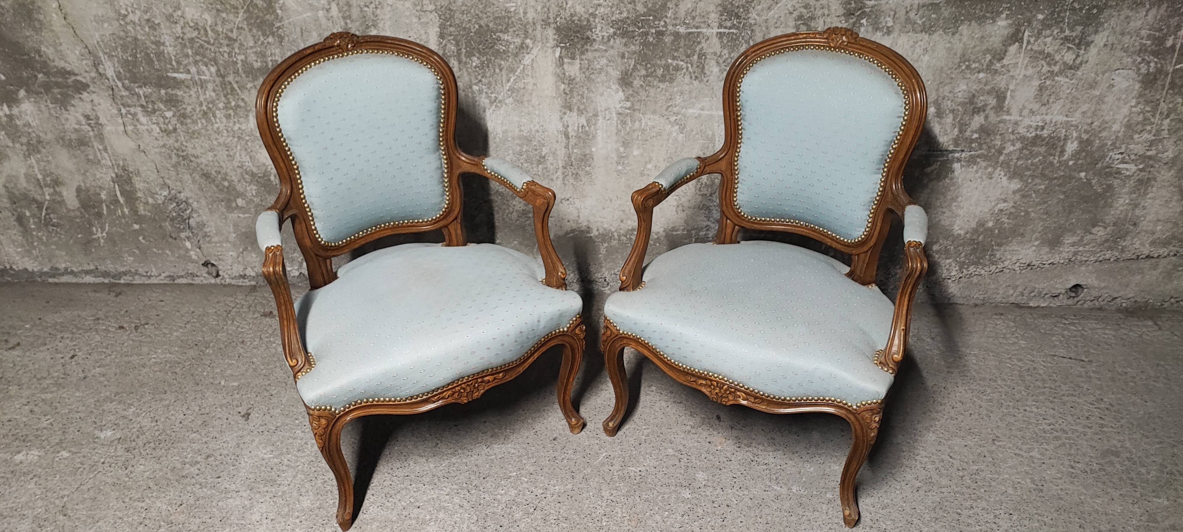 Reupholstered Louis XV convertible armchairs