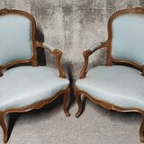 Reupholstered Louis XV convertible armchairs