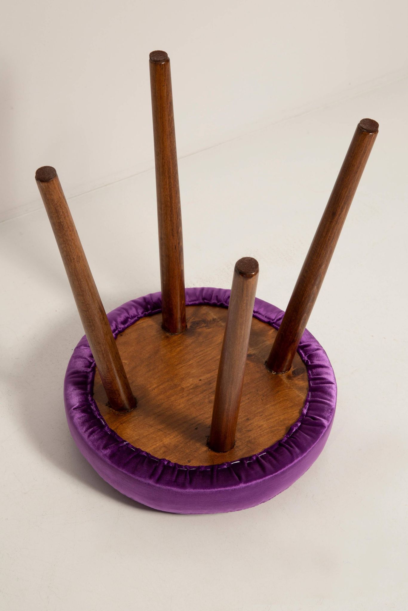 Set of two shiny purple velvet stools from the mid-century, Europe, 1960s.