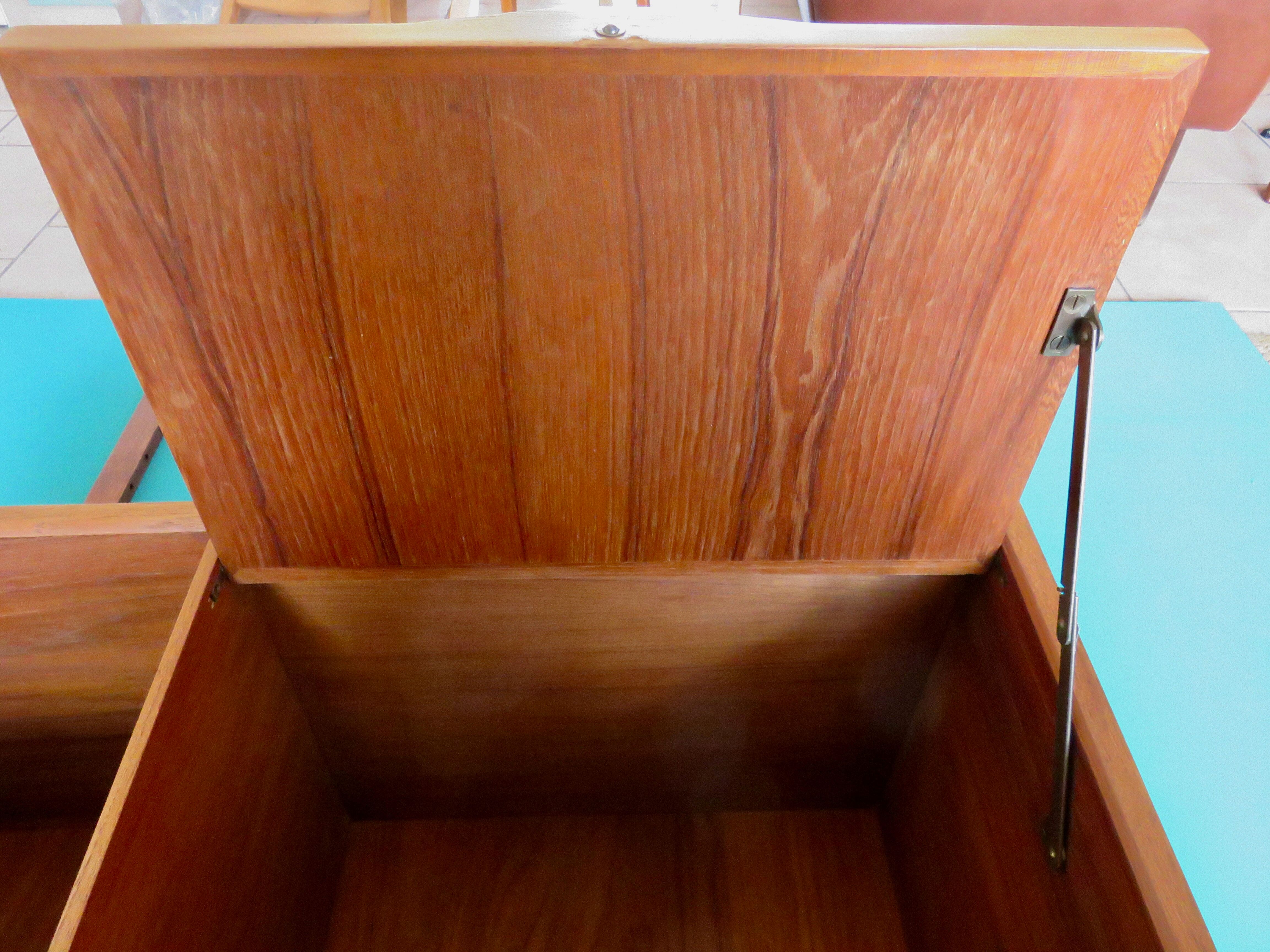 Wall shelving system and teak writing box. of Poul Cadovius. Denmark 1960