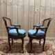Paire de fauteuils de style Louis XV en cannage