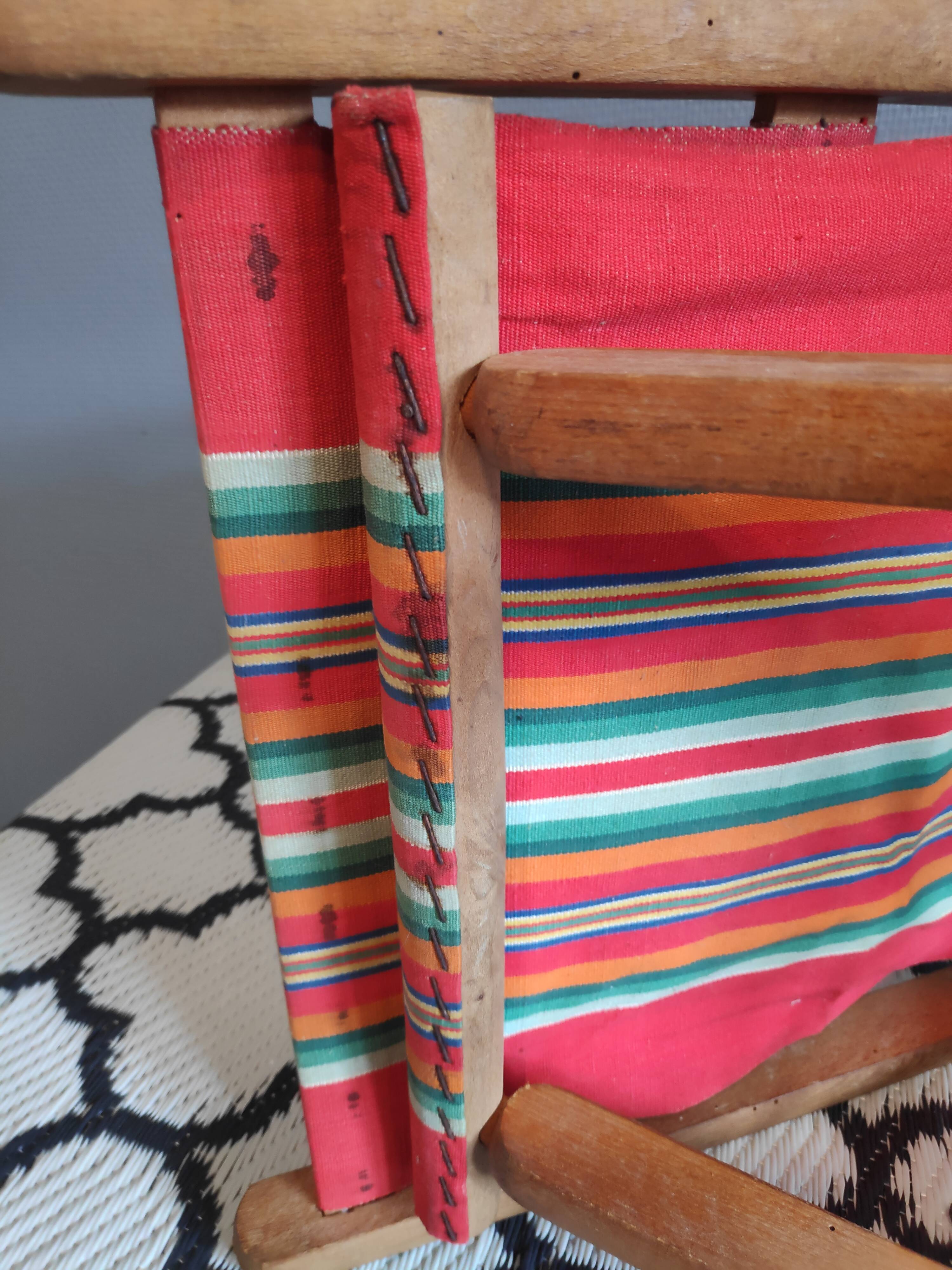 Vintage wooden folding chairs and basque fabric