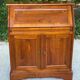 Louis Philippe donkey back secretary in solid wood, 20th century