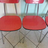 Table in red formica, 4 roc chairs, 2 extension cords, 2 drawers 60