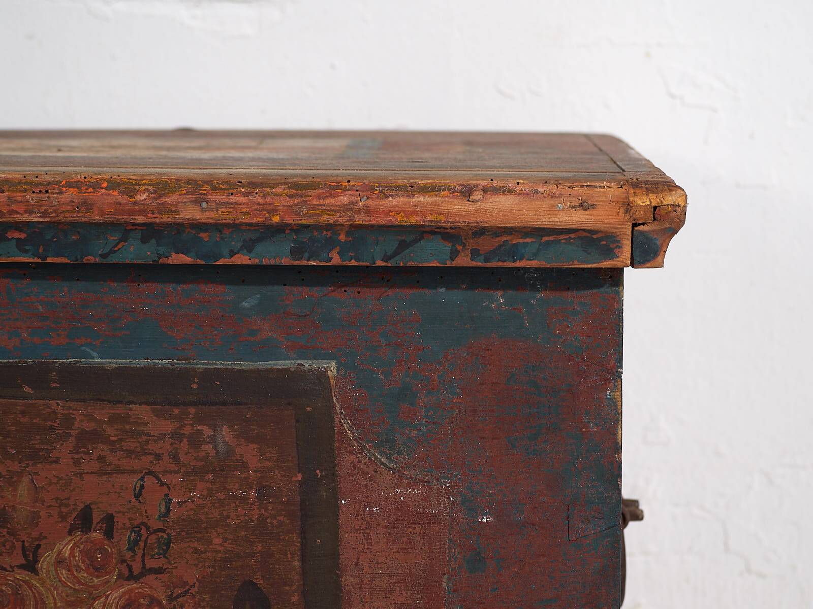 Antique red trunk with floral decoration (c.1920)