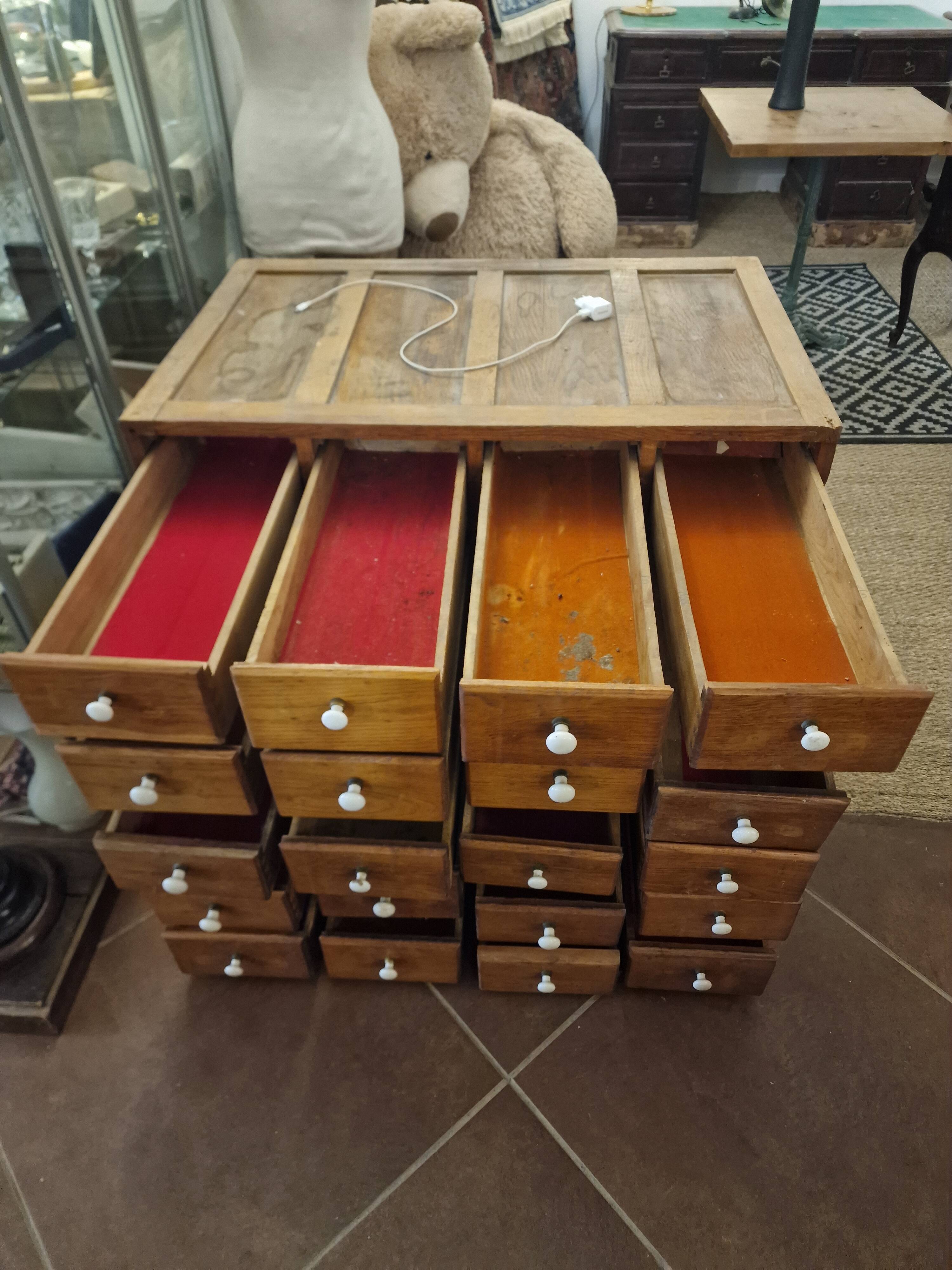 Antique craft cabinet with solid oak drawers and porcelain handles
