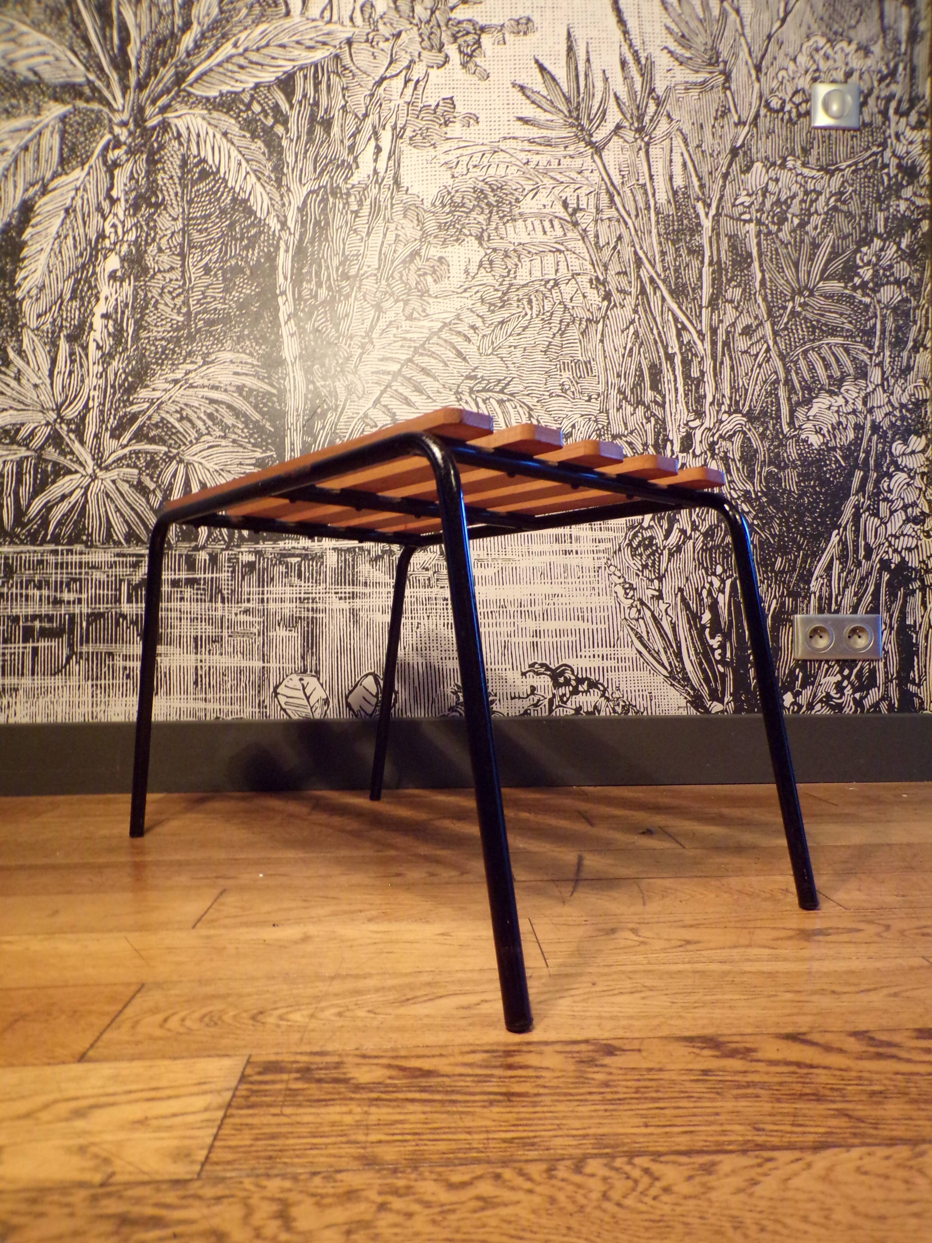 Old 1950s suitcase bench with wooden slats