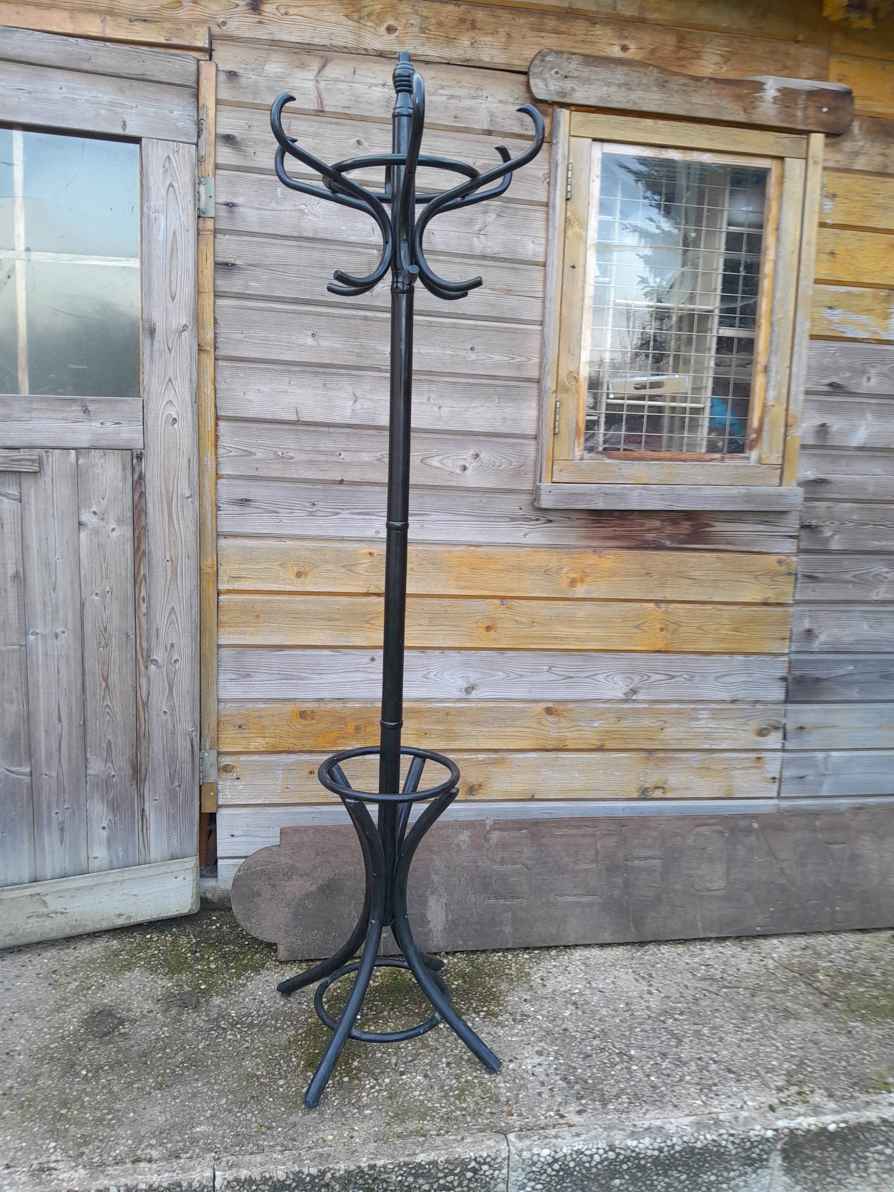 Vintage parrot coat rack in old wood