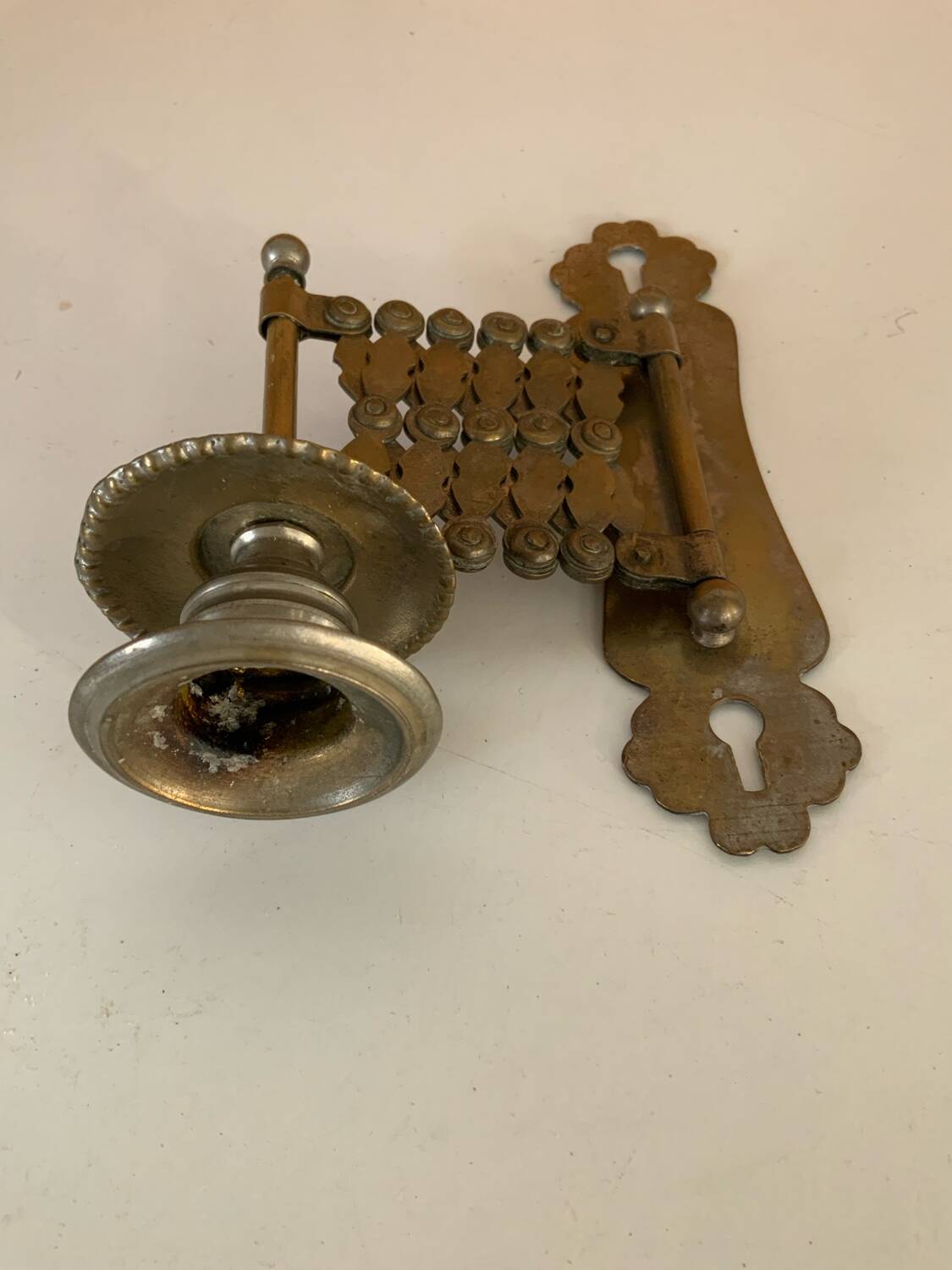 Old accordion candle holder