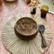 Bowl in natural coconut ecological plate