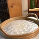 Round tray in mother of pearl and rattan