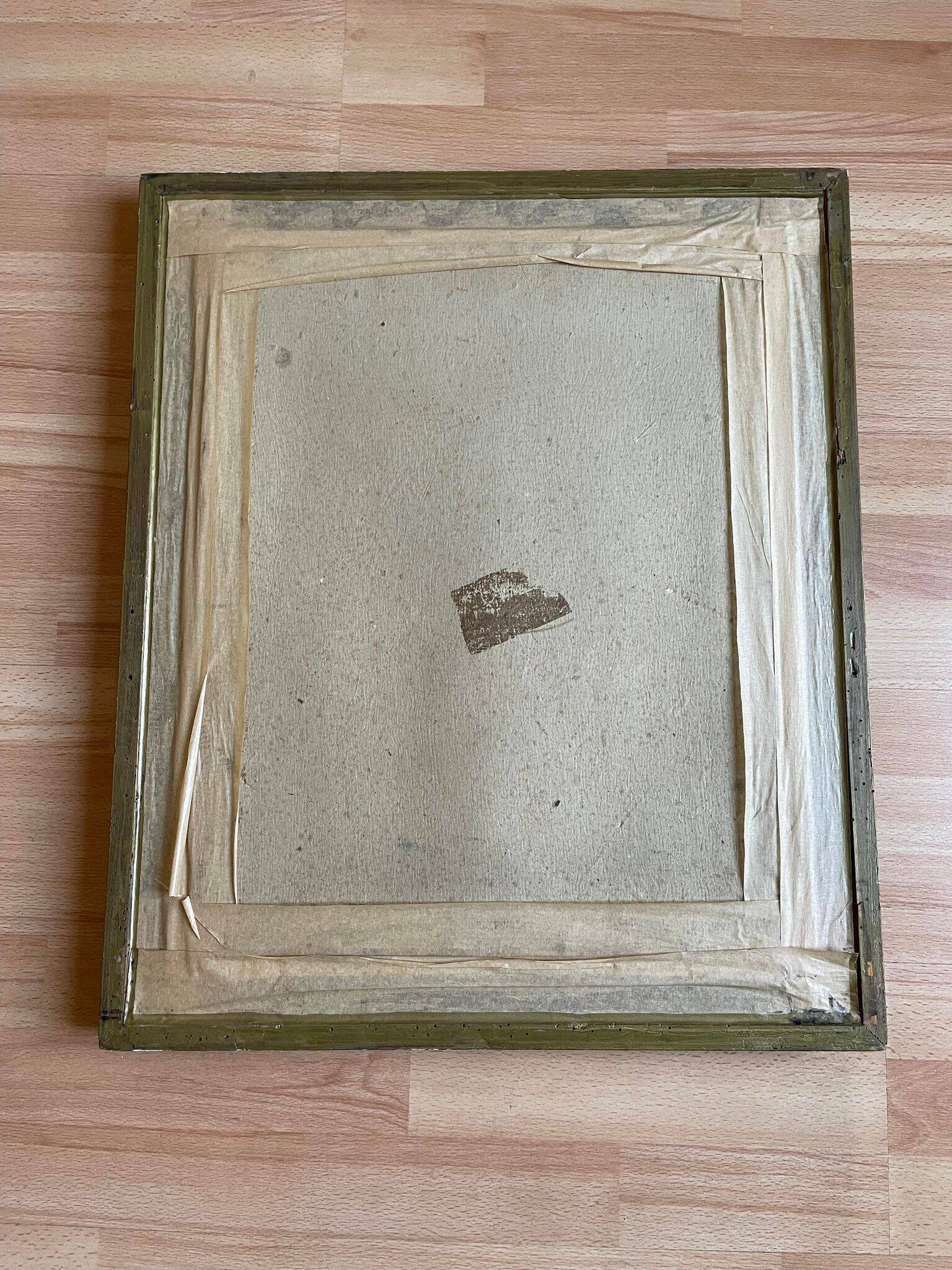 Old mirror with golden wooden frame