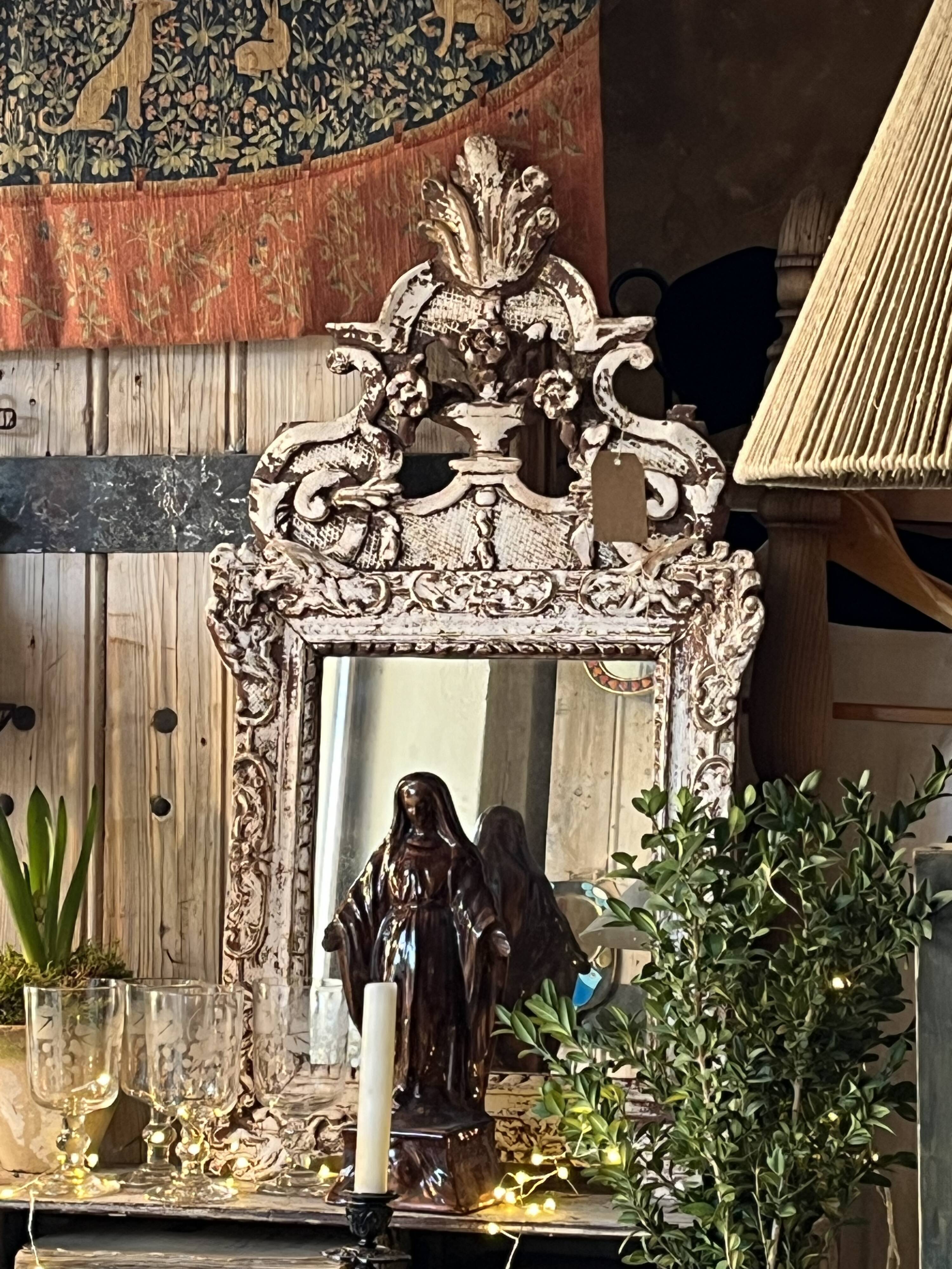 Carved wooden mirror