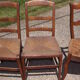 17 old straw chairs