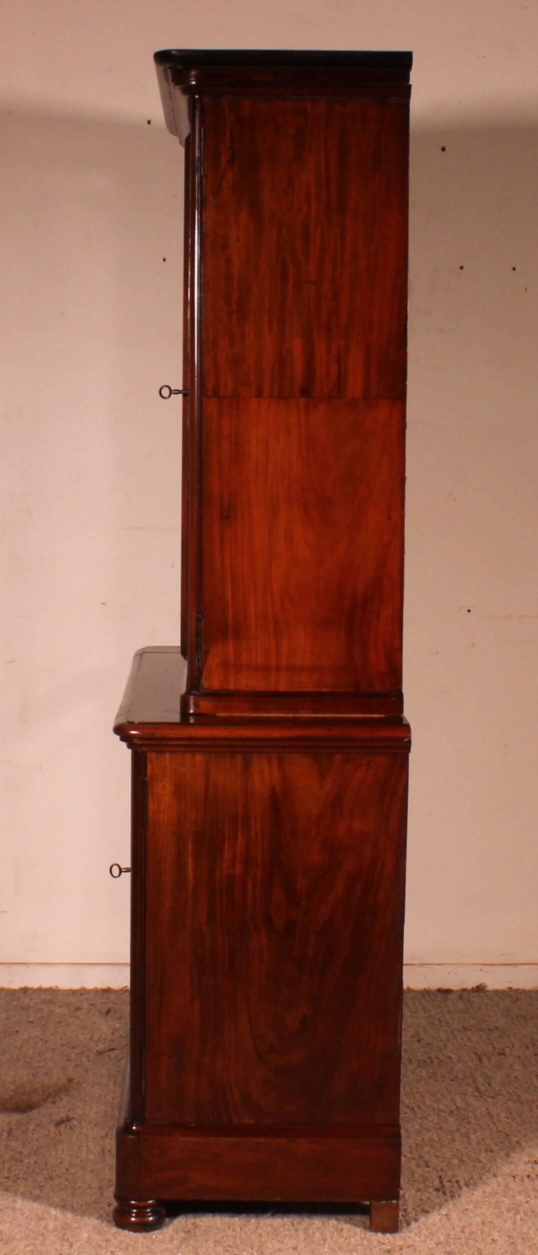small two-body solid mahogany desk from the early 19th century with writing surface
