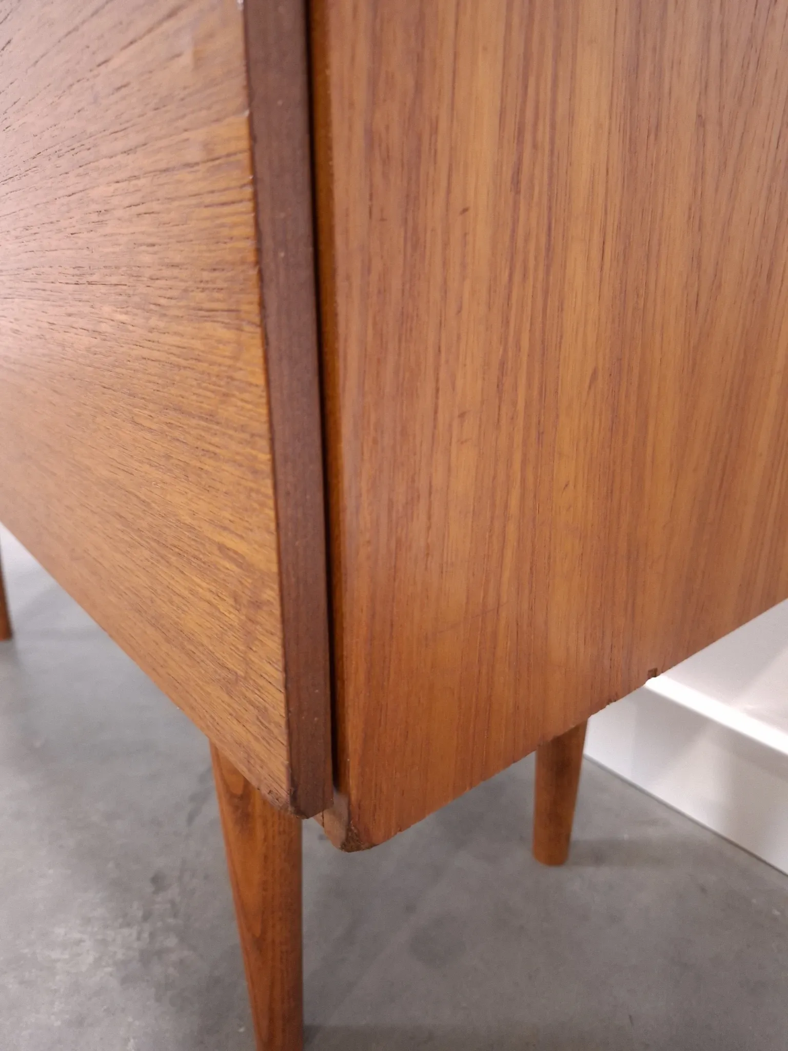 Vintage small teak cabinet with drawers, flap and black handles, hallway cabinet.