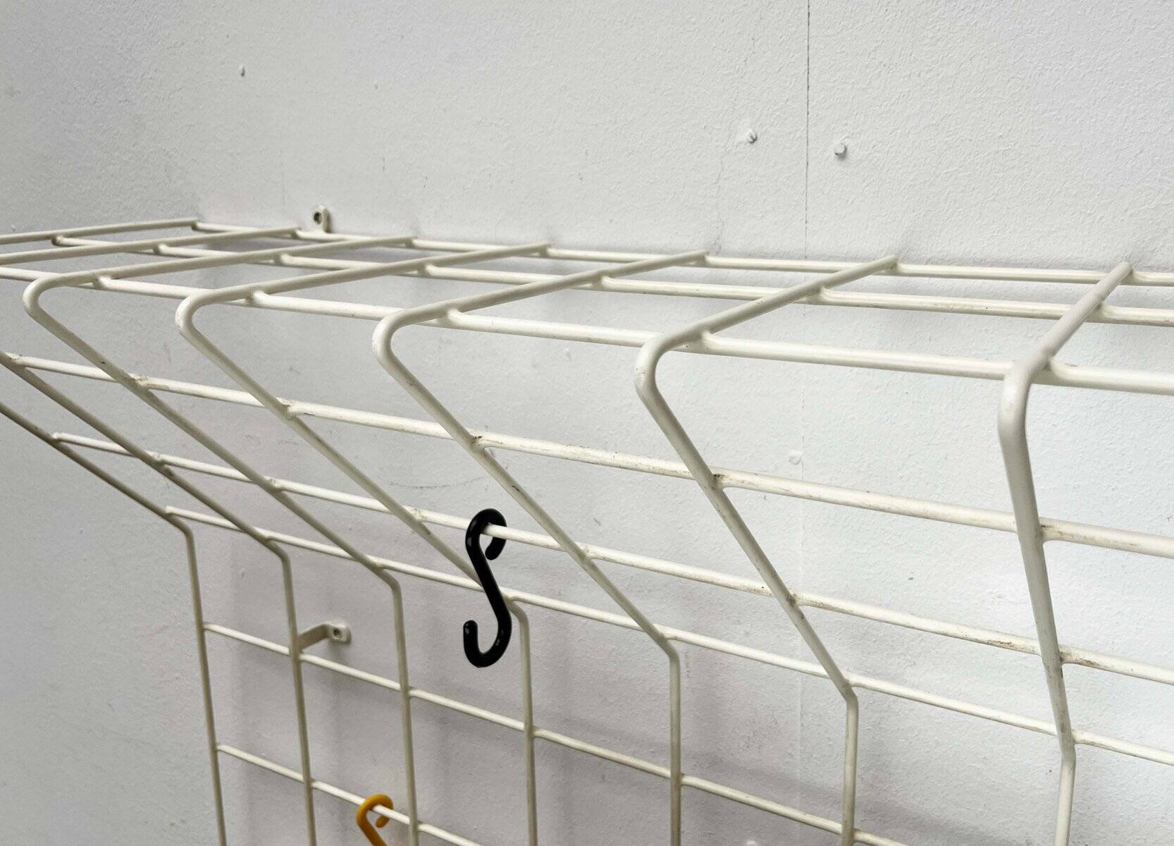 Minimalist white wire coat rack from mid-century Germany, 1960s.