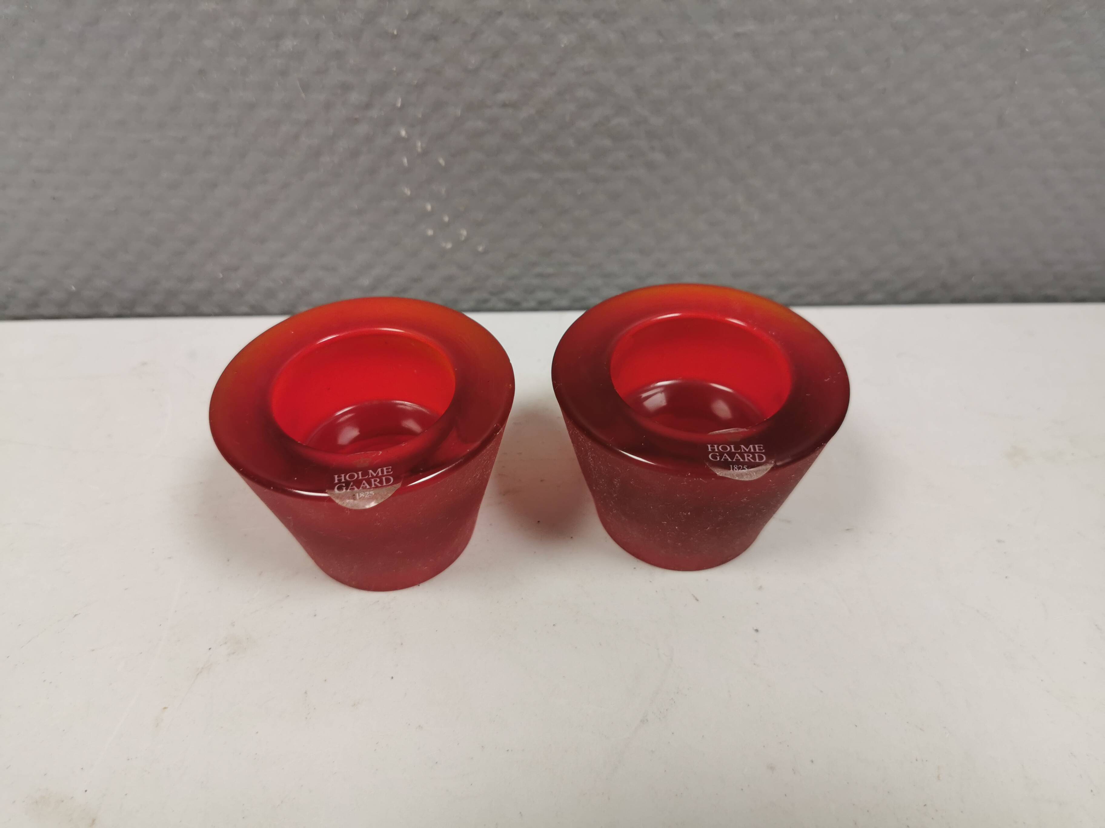 Reversible glass candlesticks with a conical shape for tealights or candles