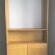 Dressing vintage Scandinavian style in light wood with wardrobe and cupboard.