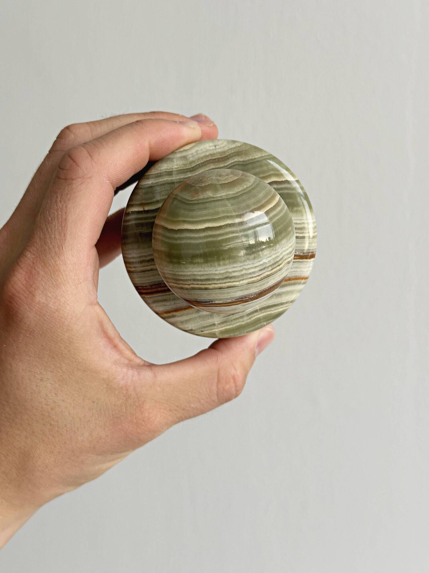Green veined stone paperweight
