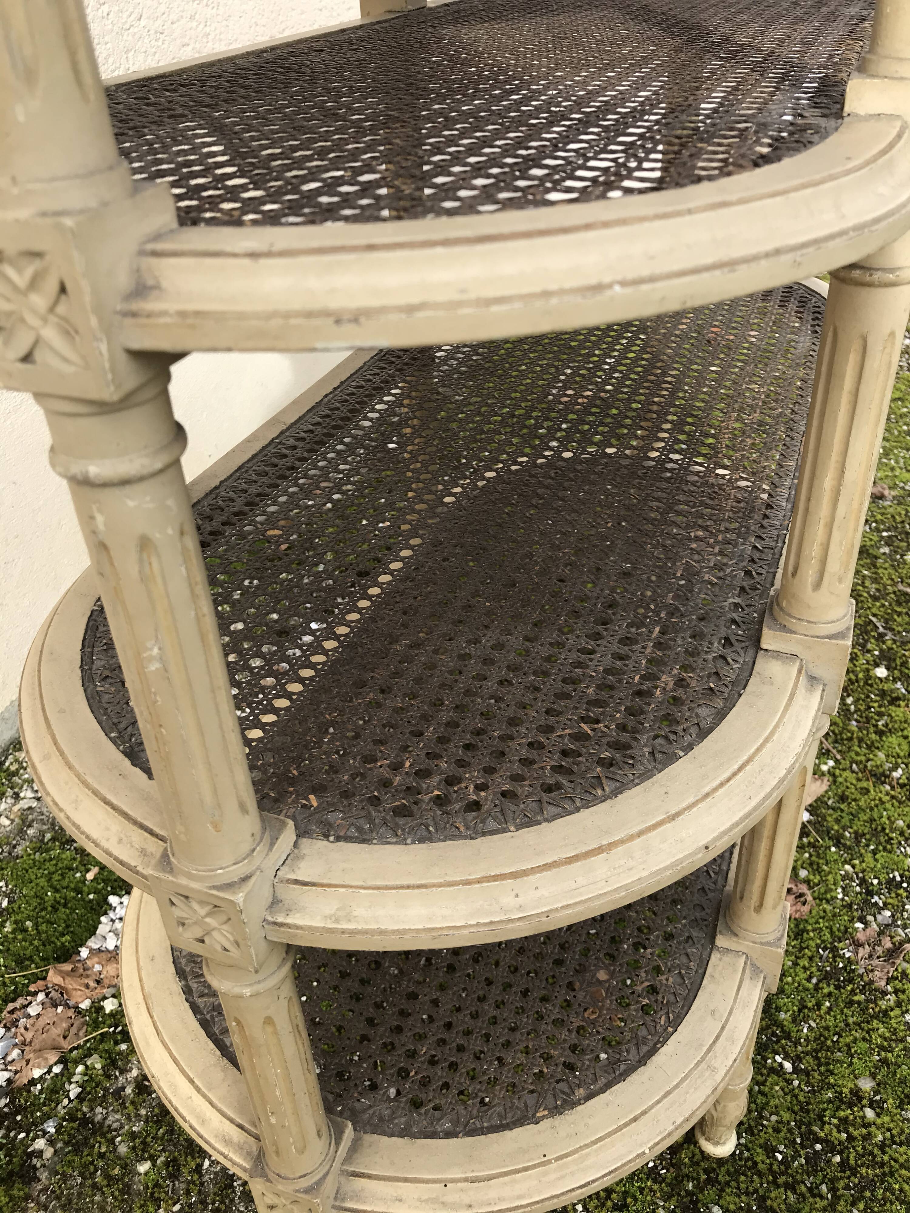 Wooden saddle on three shelves