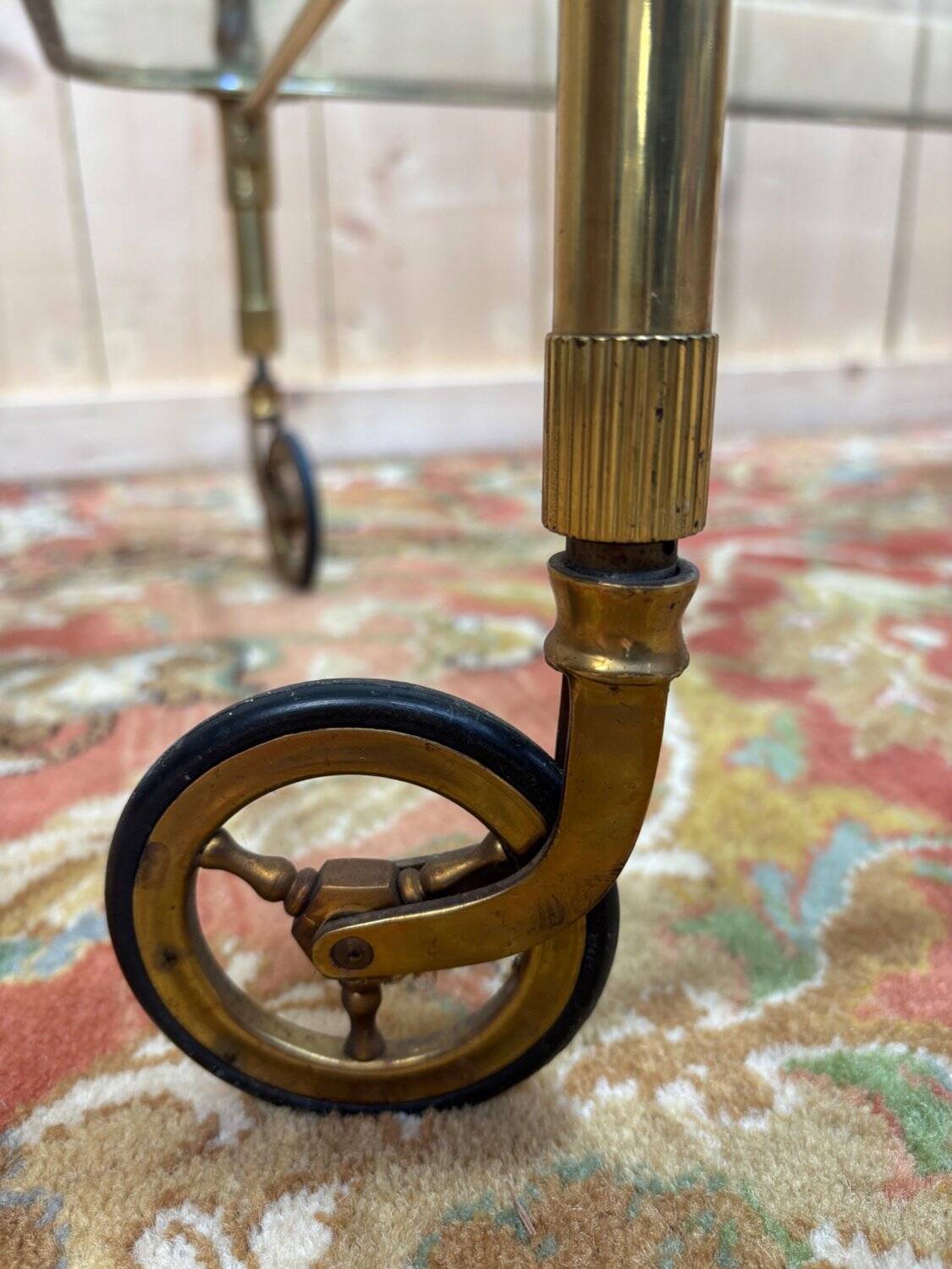 Glass, brass, and wood side table from the 1950s/60s.