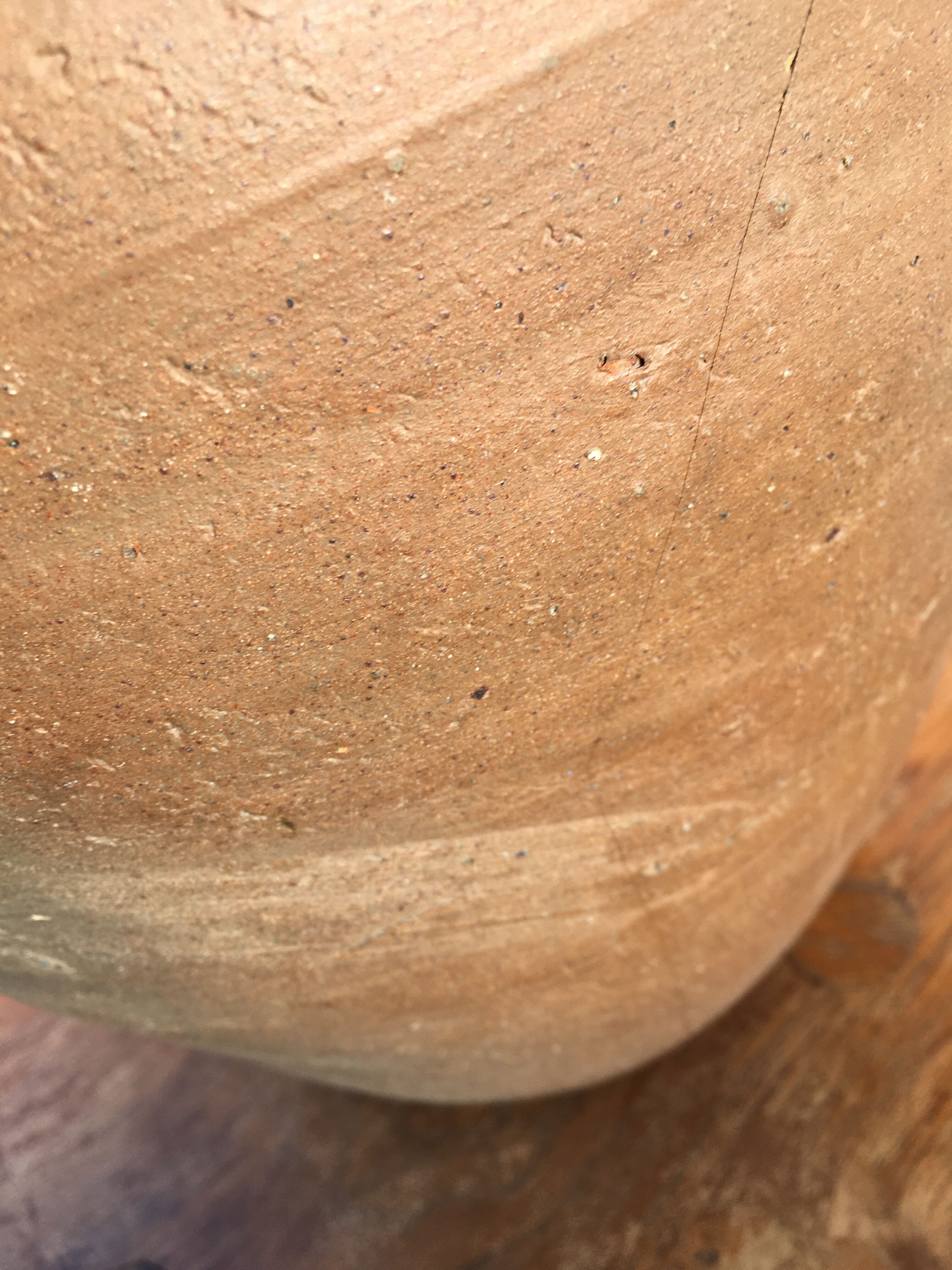 Old jug with two sandstone handles