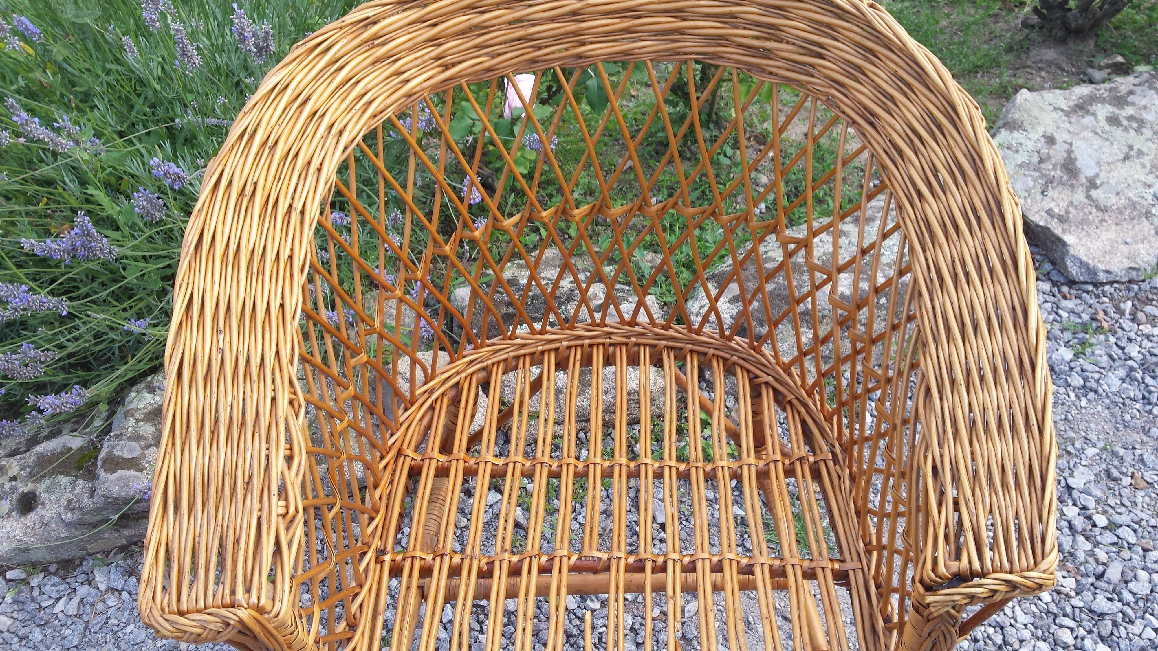 Wicker or rattan armchairs