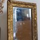Antique mirror in gilded wood