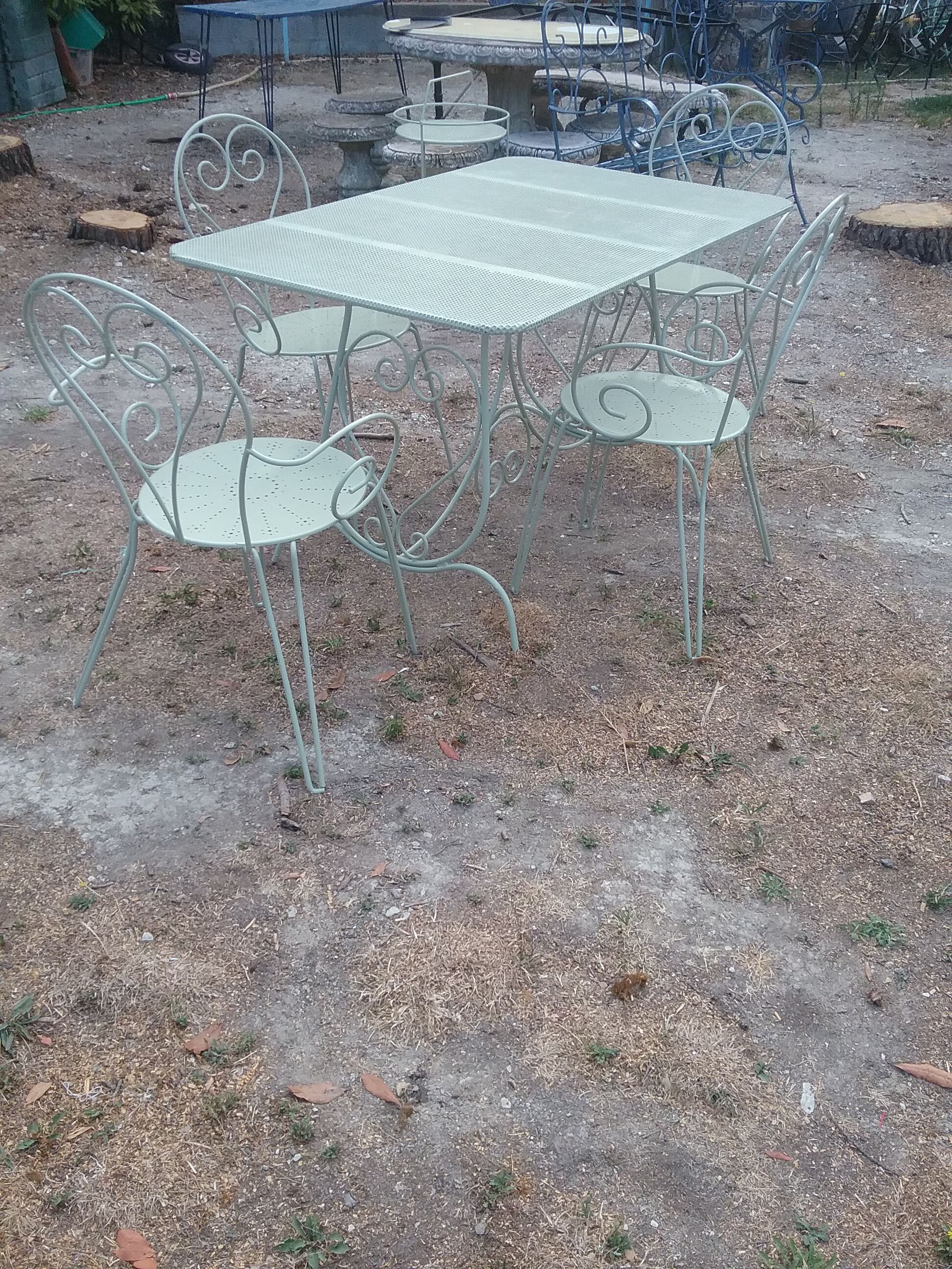 Salon de jardin en fer forgé vert