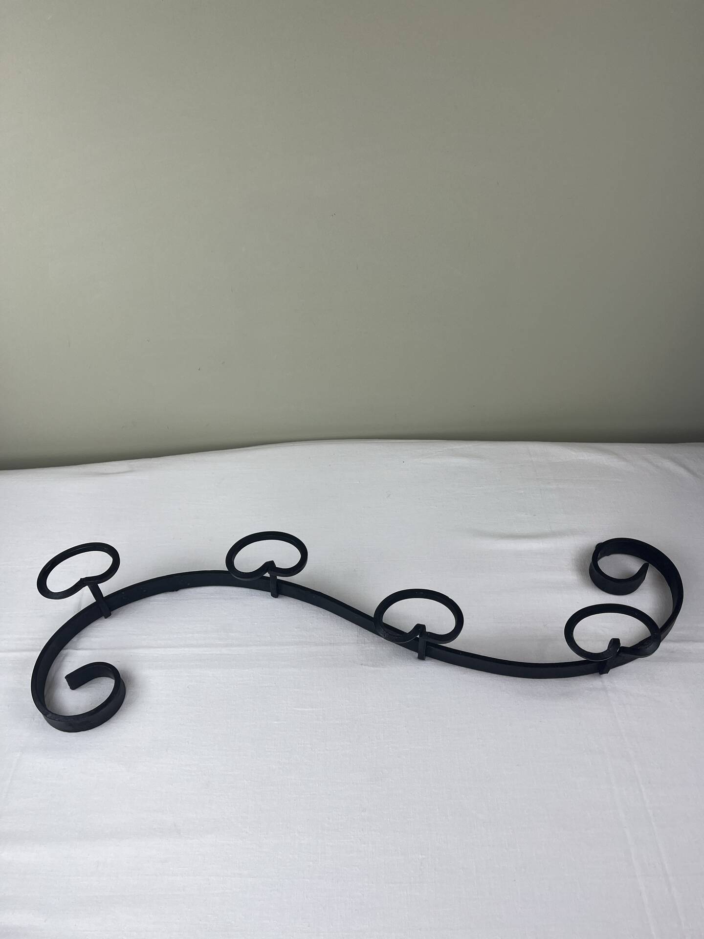 Wrought iron coat rack