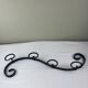 Wrought iron coat rack