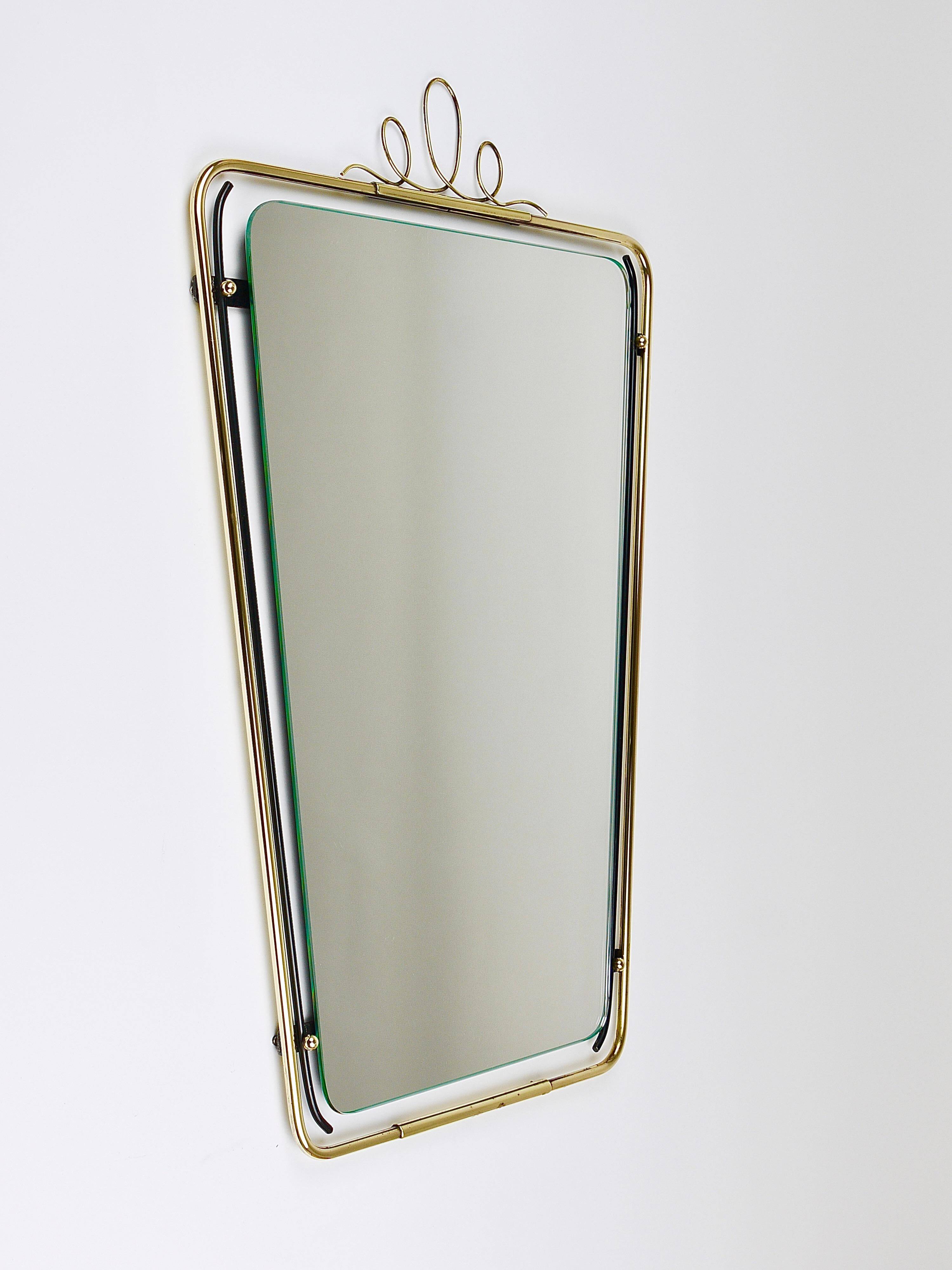 Wall mirror in brass wire with modernist loops from the mid-century, Italy, 1950s.