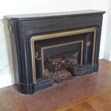 Fireplace XVIII° black marble louis XIV style with narrowed and floor slabs
