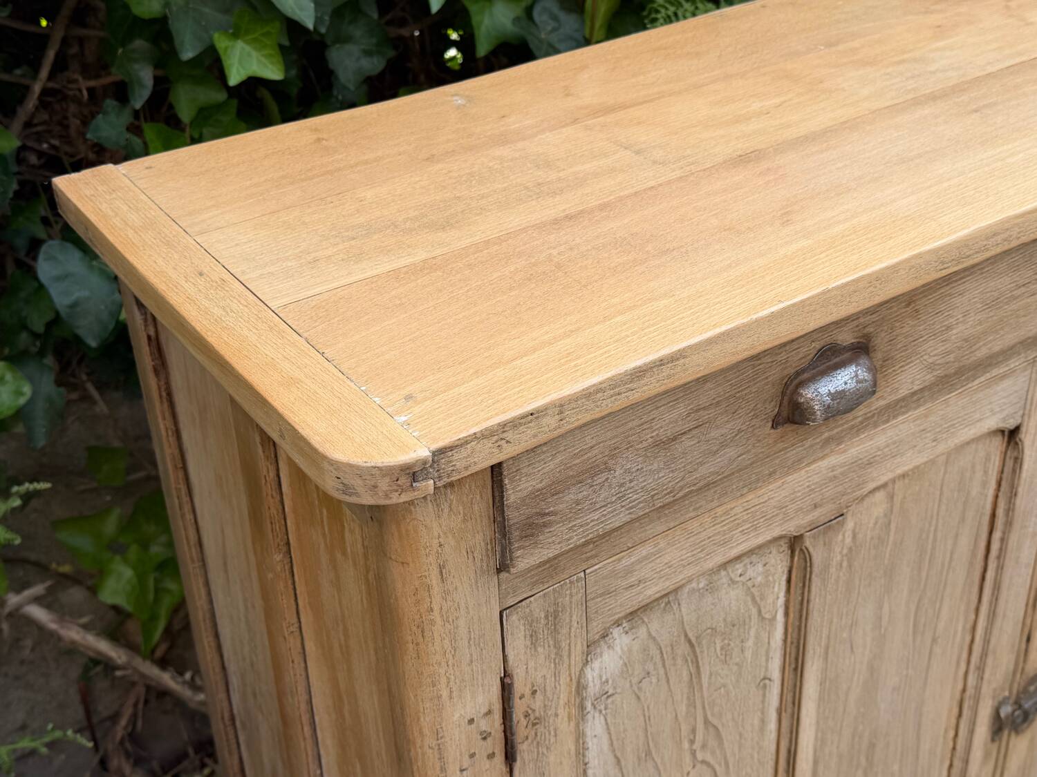 Antique patinated Parisian buffet with shell handles.