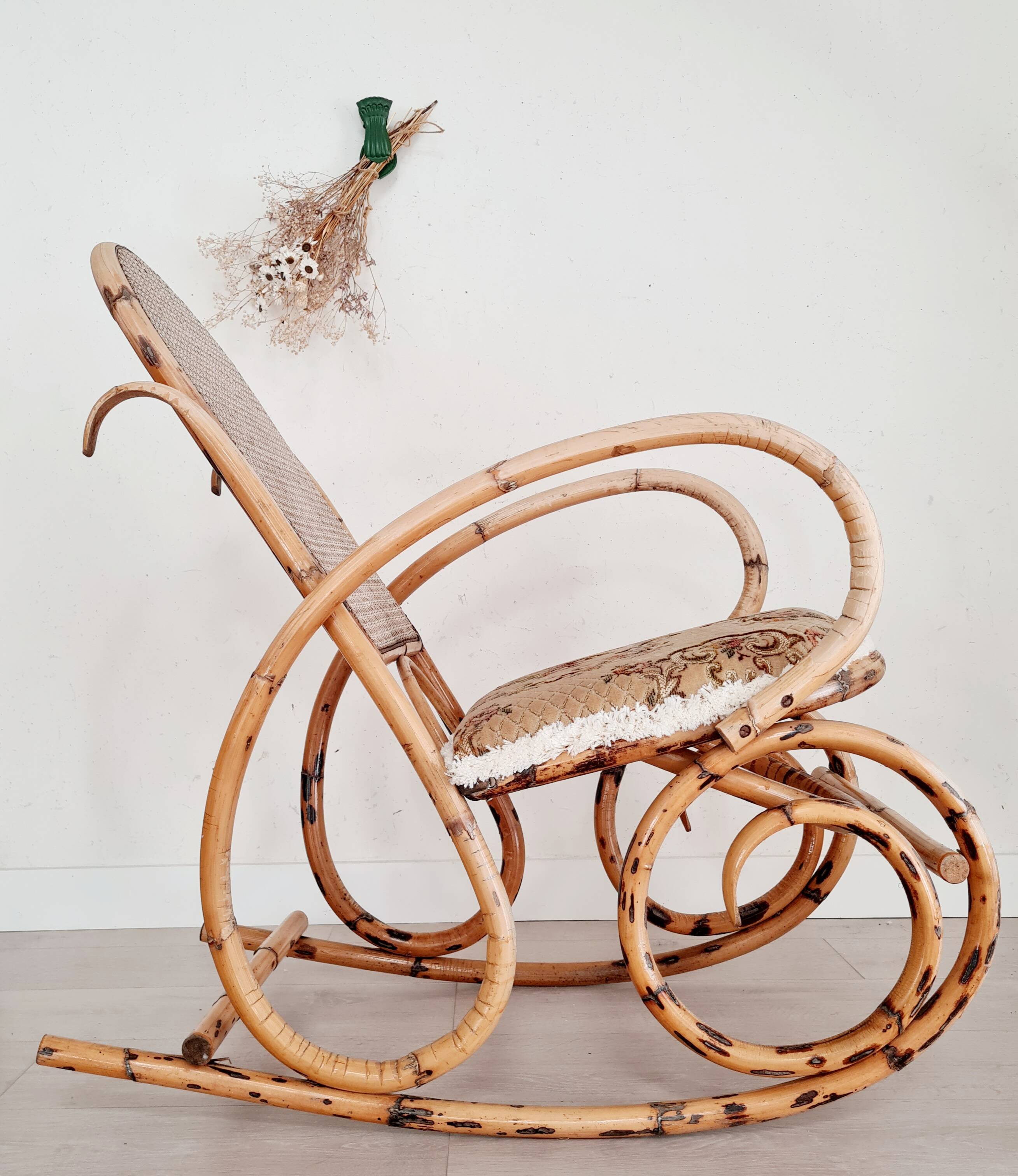 Cane rocking chair and upholstered seat