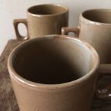 Lot of three cups or mugs stoneware of great fire of Brenne, France