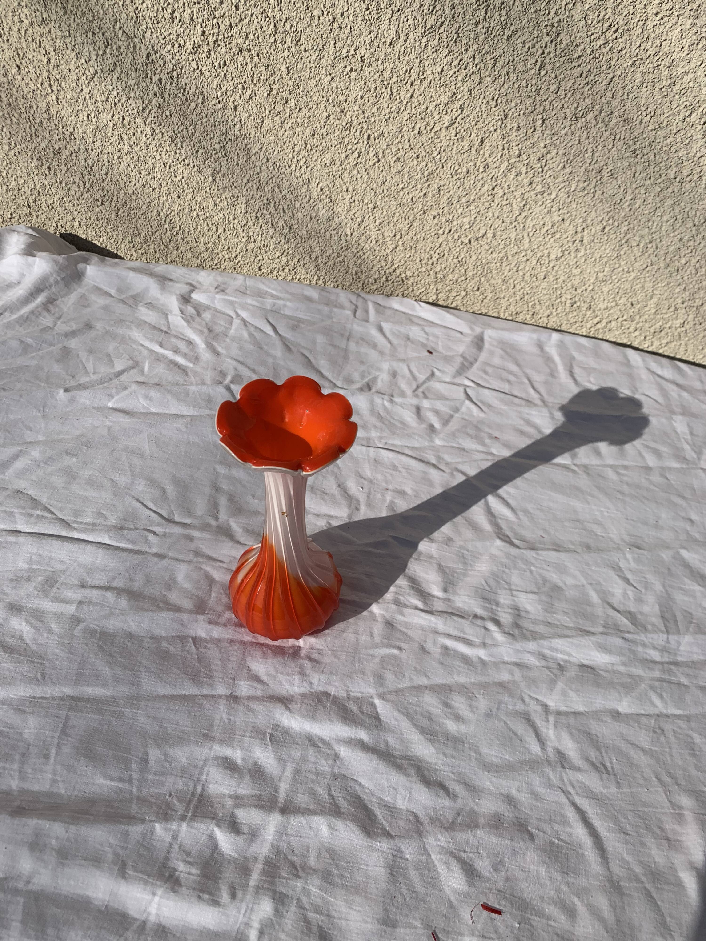 Orange and white opaline vase in the shape of a vintage flower corolla