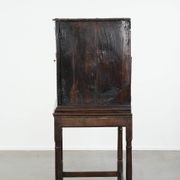 Unique antique English cabinet on stand made of oak from the 17th century