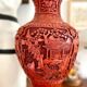 Asian metal vase and red resin
