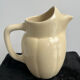 Ivory ceramic jug "La Sté Uzienne"