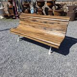 Antique garden bench made of cast iron and oak slats