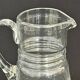 Ancienne carafe  pichet en verre soufflé  décor de feuilles ciselées 1940