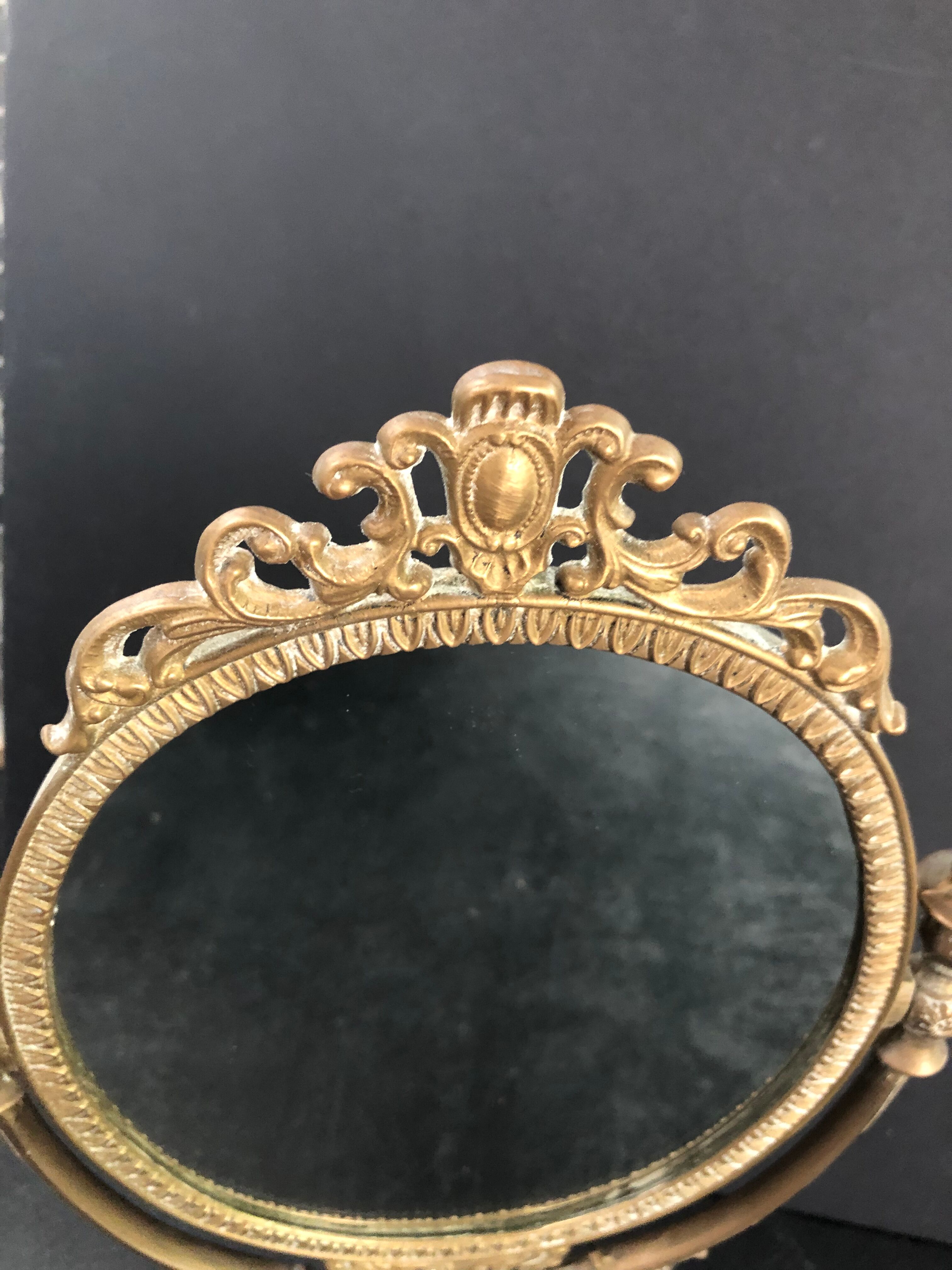 Swivel bronze mirror