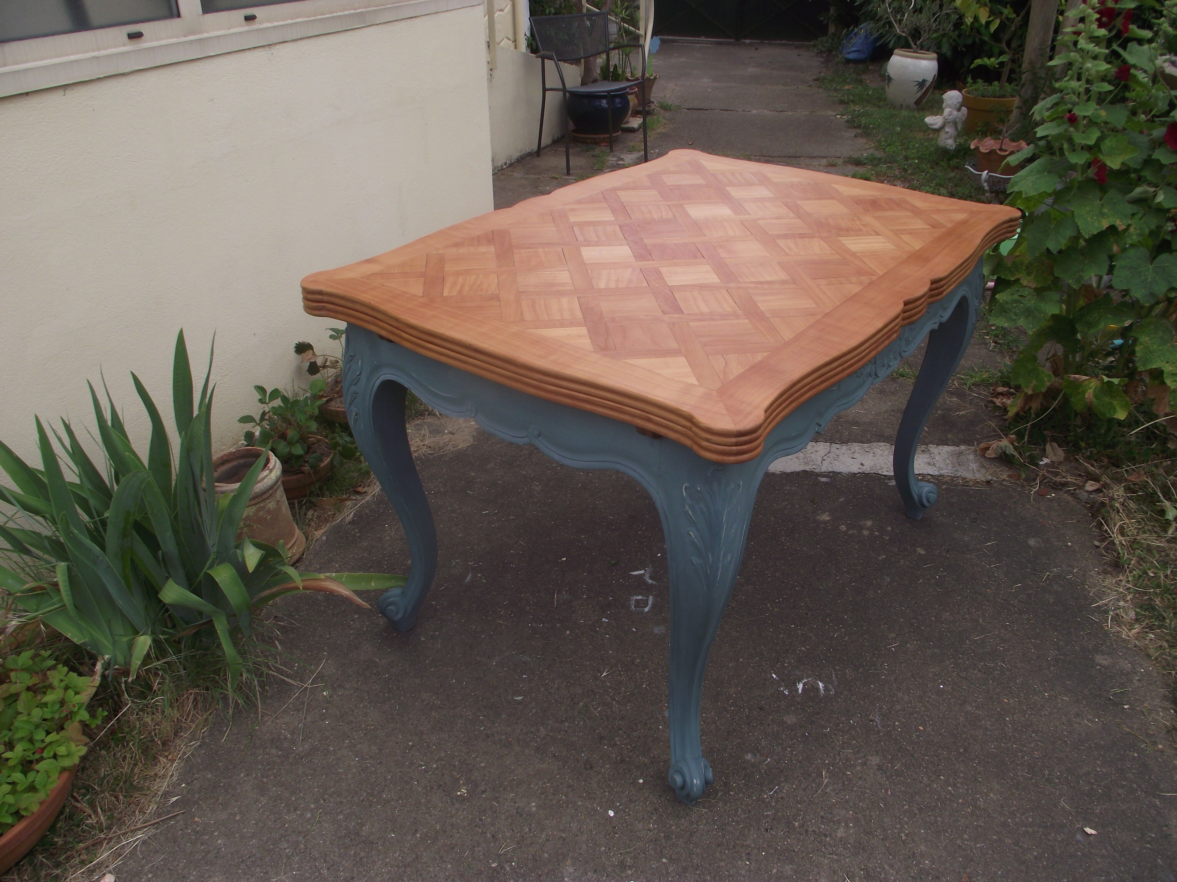 Louis XV-style extension table in solid cherry.